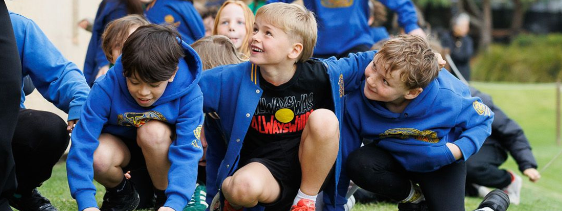 children outside a Museum engage in a school tour